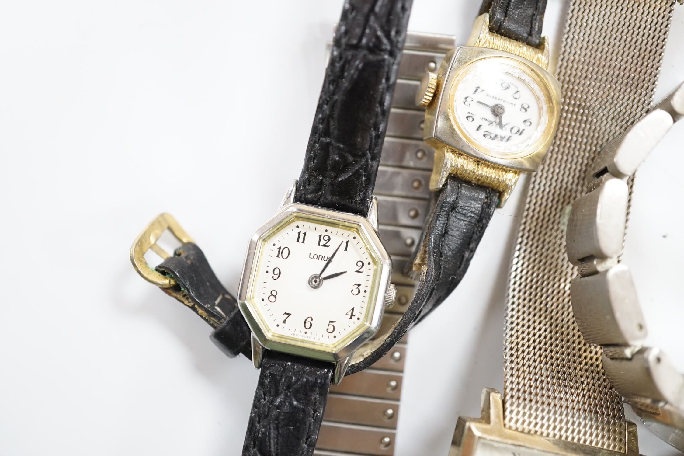 A large quantity of assorted mainly modern wrist watches, wrist and pocket movements, straps, bracelets, etc.